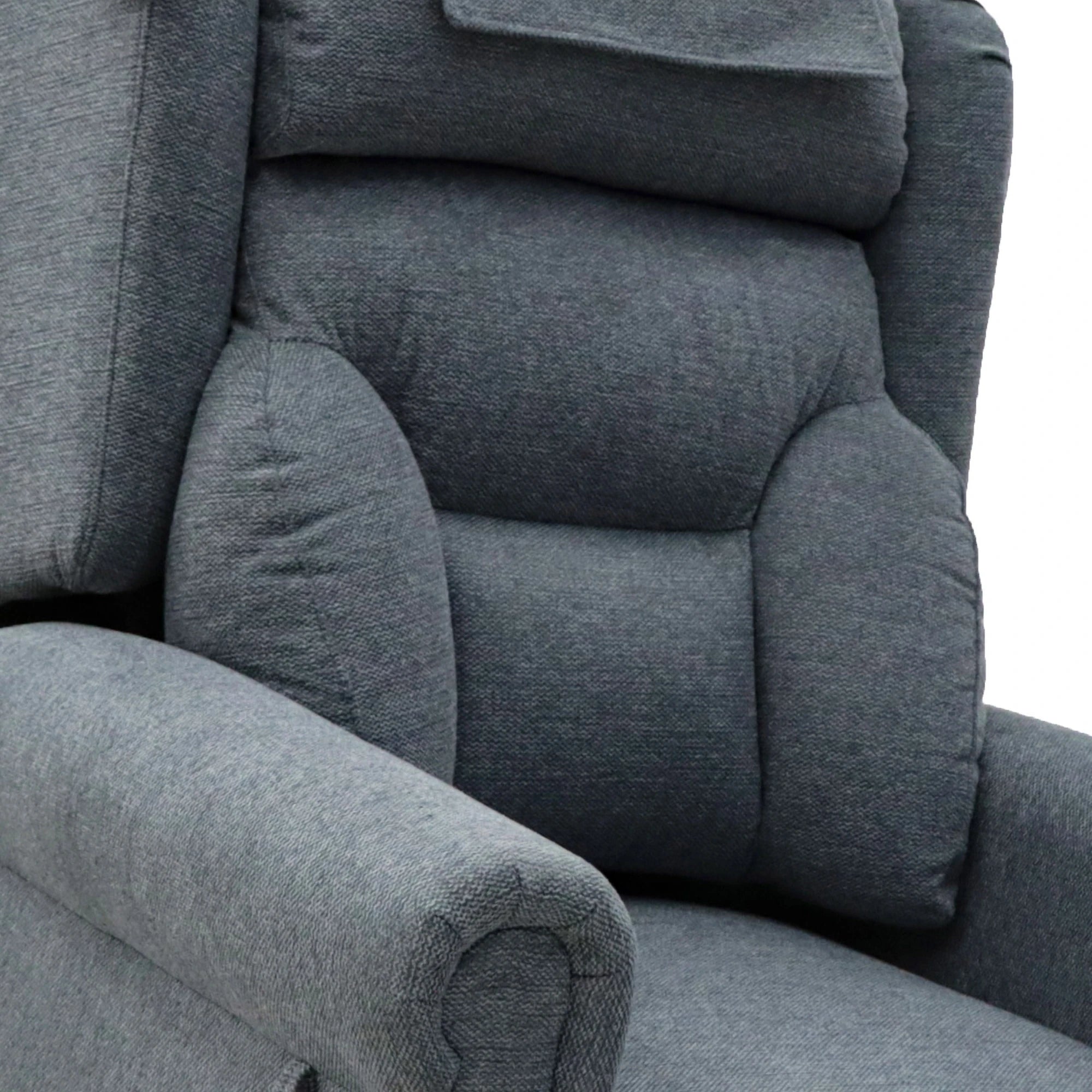 Close-up of a gray upholstered recliner chair showing padded backrest, armrest, and headrest cushion against a white background.