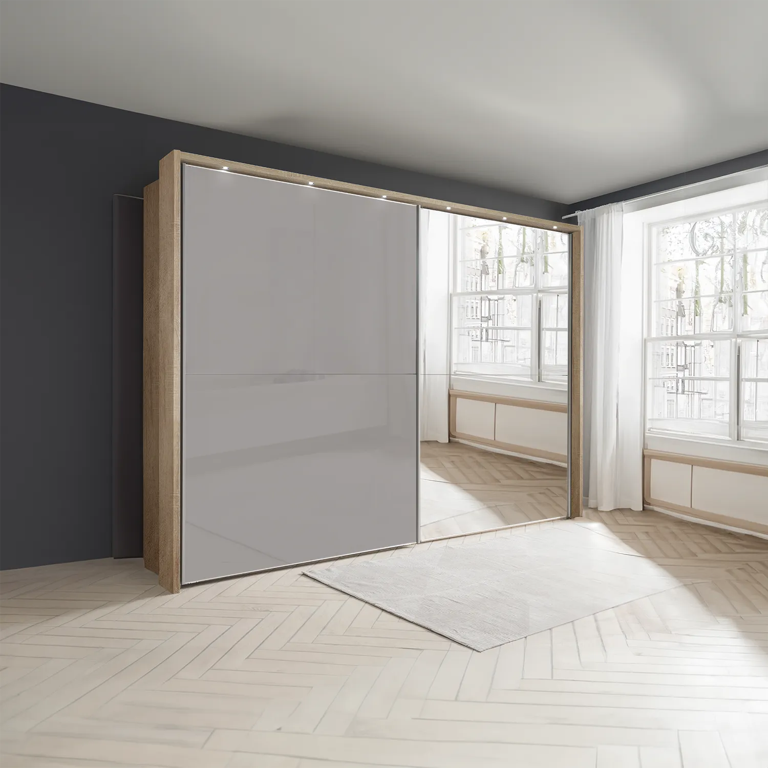 Wiemann Bristol Rustic Oak and Pebble Grey Sliding Door Wardrobe With Mirror, We will Deliver and assemble the wardrobe. Available in 4 Width Sizes 150cm, 200cm, 250cm and 300cm height is 217cm - Lifestyle Image