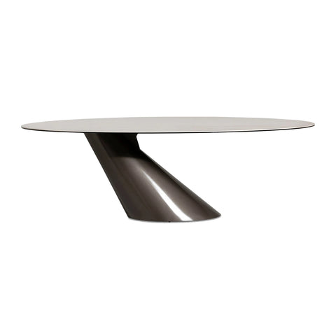 The Brann 200cm oval ceramic dining table features a white ceramic top and sculptural bronze pedestal base. Seats up to 6 in contemporary style.