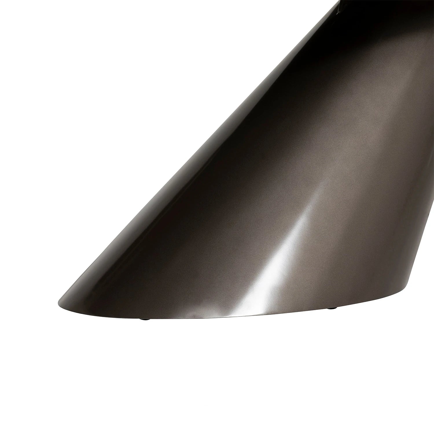 Base close up of Brann oval dining table showcasing ceramic top and metal base