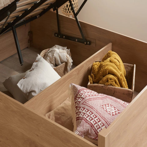 Spacious under bed storage compartment for bedding.