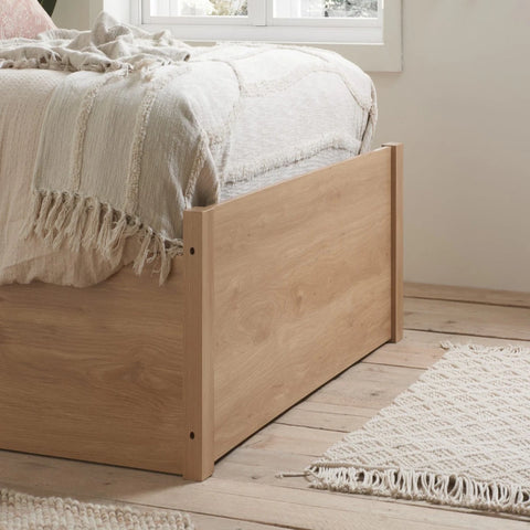 Strong wooden bed frame built for durability.