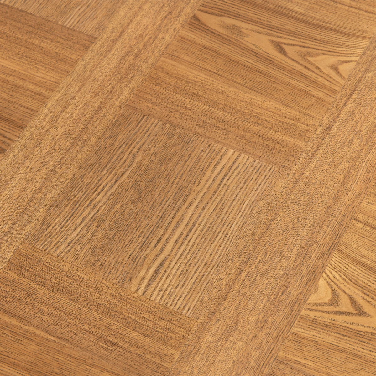 Close-up of wooden dining table with a herringbone pattern
