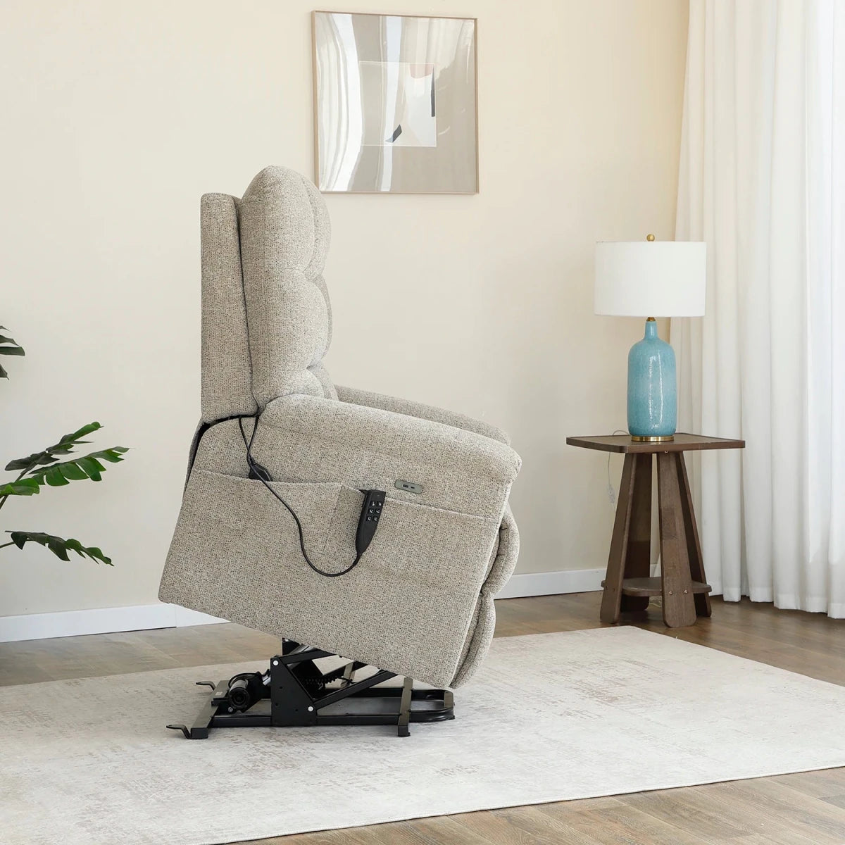 Brynn Beige triple motor riser recliner with heat, massage and independent headrest adjustment. 