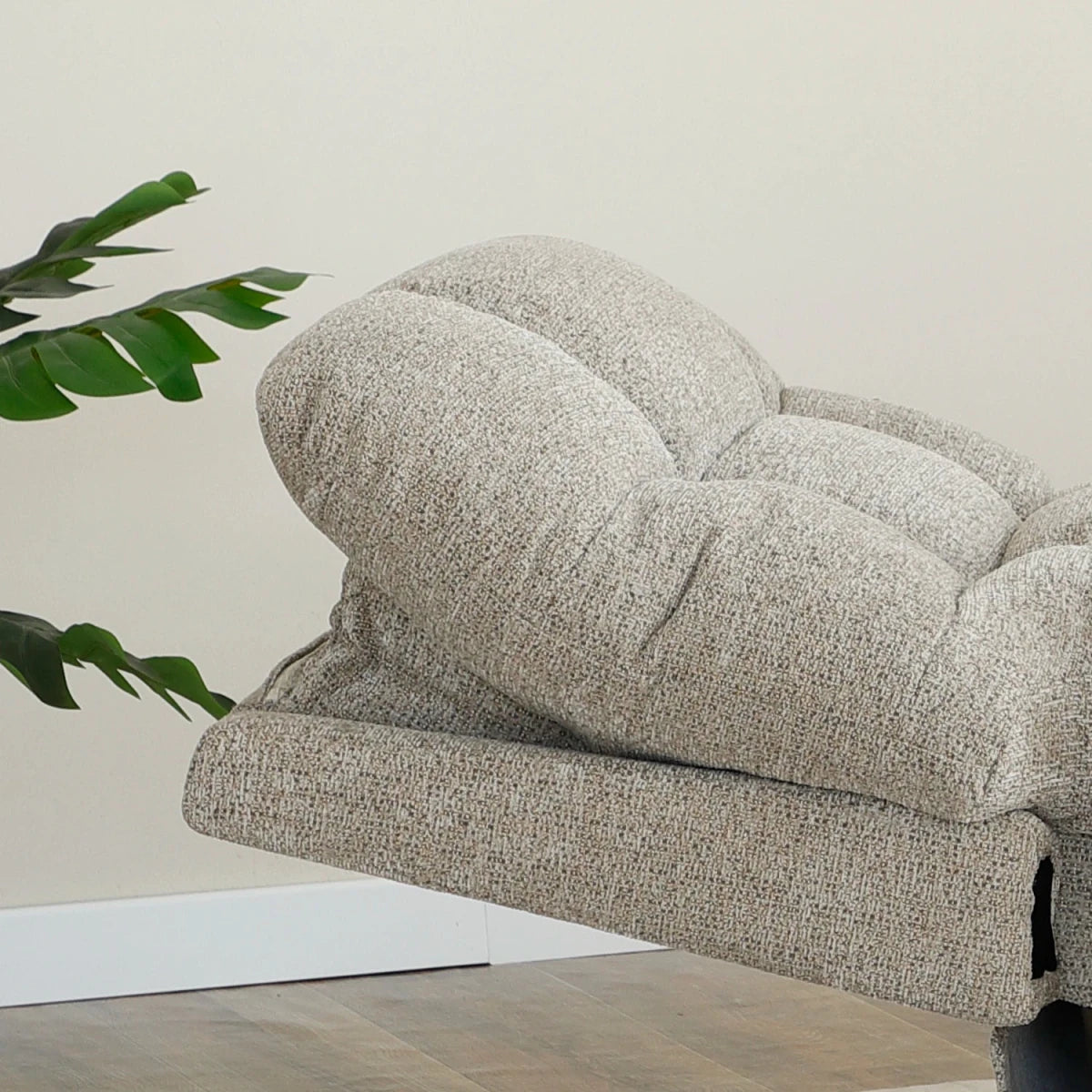 Close up of Backrest of Brynn Egyptian Sand Fabric  triple motor riser recliner with heat, massage and independent headrest adjustment. 