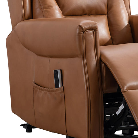 Close-up of a Buckingham Camel Full Leather Lift & Tilt Recliner showing the side pocket with a remote control inside, the extended footrest, and the black support mechanism underneath, on a white background.