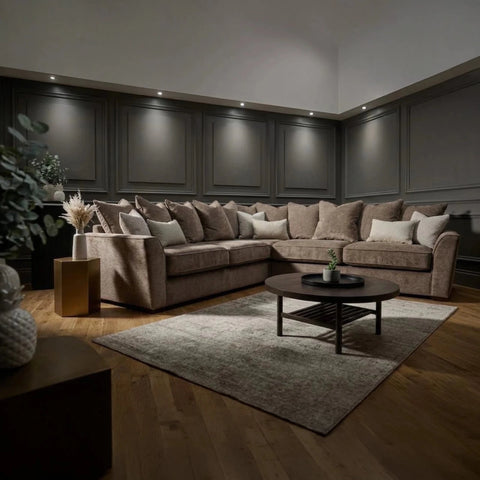 Luxury Buoyant Caspian Marlon taupe corner sofa with plush scatter cushions and sleek dark wood feet.