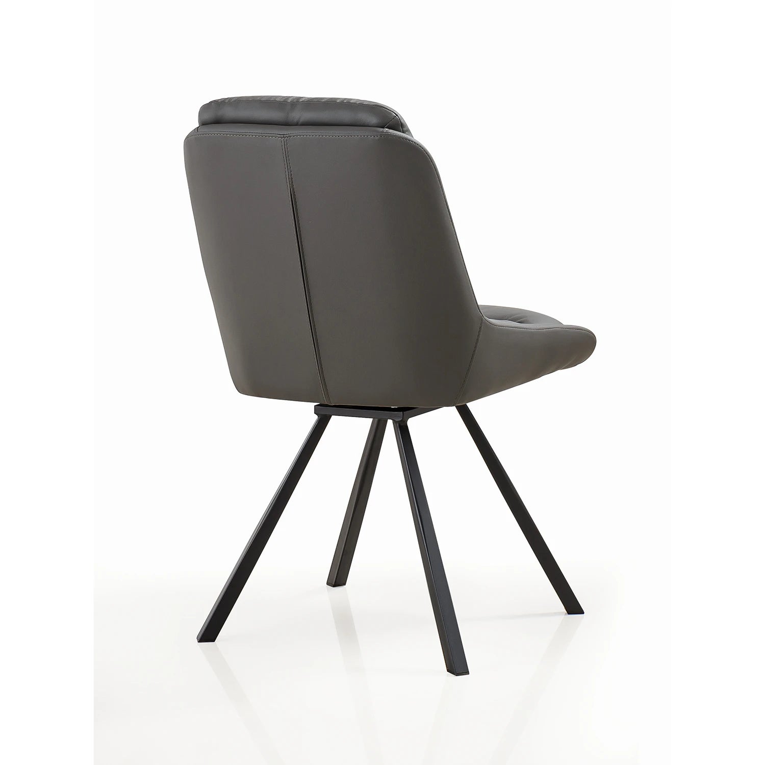 A modern dark gray Leather upholstered Burnham dining chair with a black metal tripod base, shown from a three-quarter rear angle on a white background.