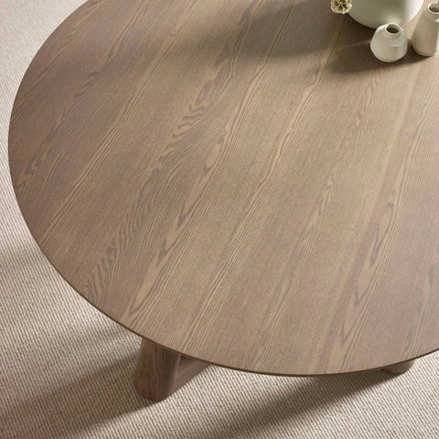 Table top of Cara 120cm Smokey Oak Effect Round Dining Table. 