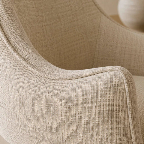 Close up arm of Caspian Ivory Chenille Swivel Lounge Chair