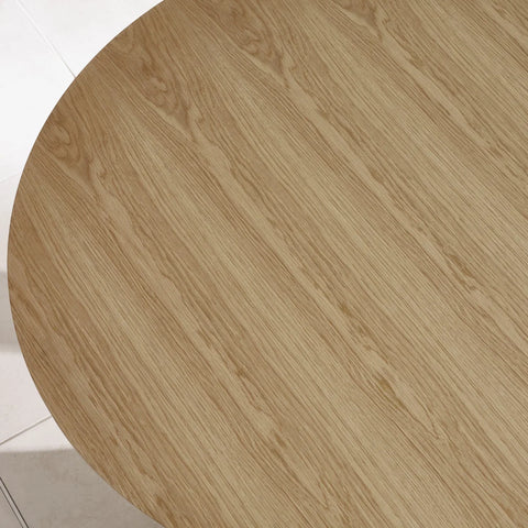 Round wooden table top with a light brown finish on a white background