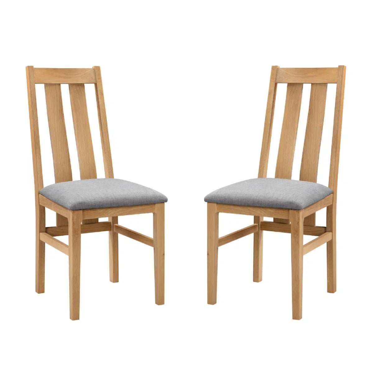 Two wooden dining chairs with light gray upholstered seats, shown side by side on a plain white background.