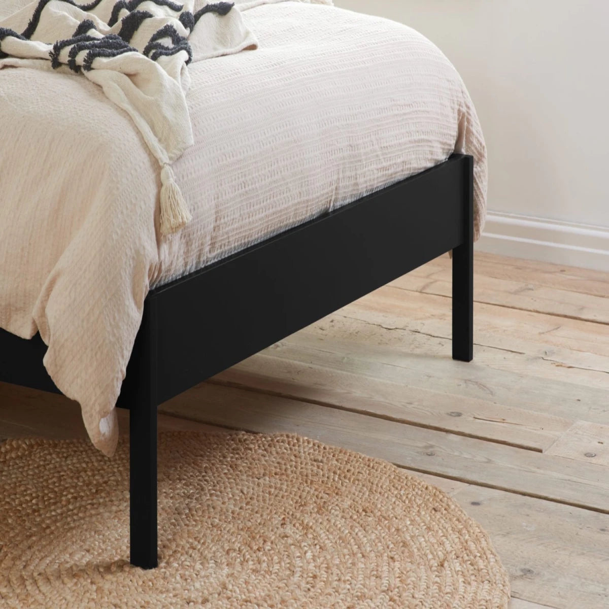 Sleek support legs complementing frame design.