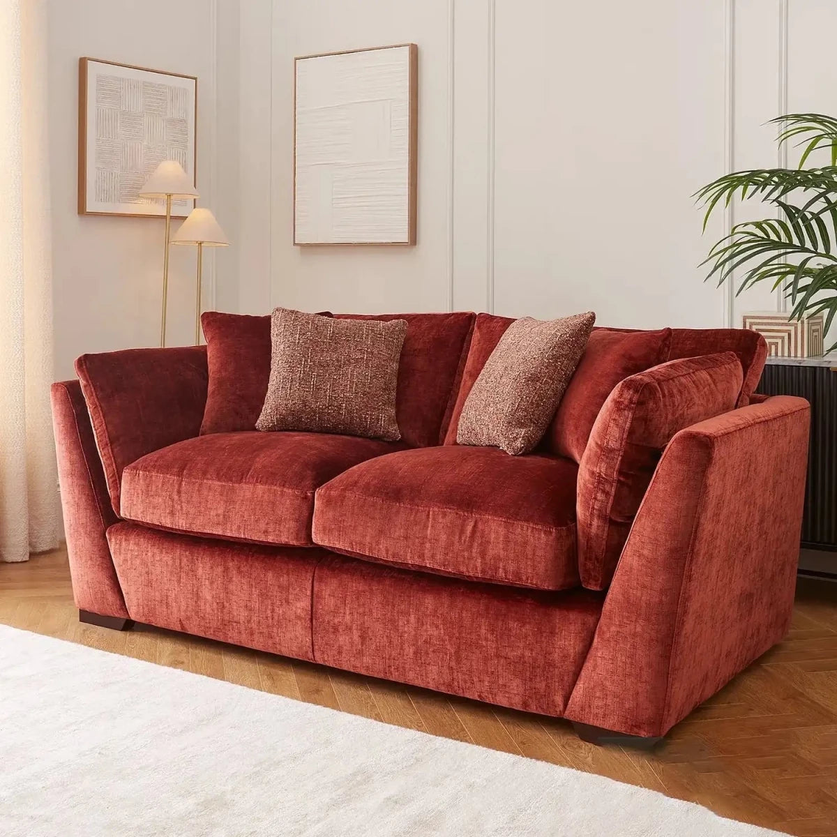 Caressa Fabric 2-Seater Sofa angled view in a modern living room