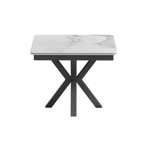 Small table with white marble effect top and black metal legs on a white background