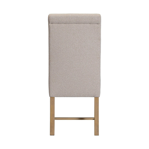 Back view of Chateau Hing Back Beige upholstered chair with wooden legs on a white background