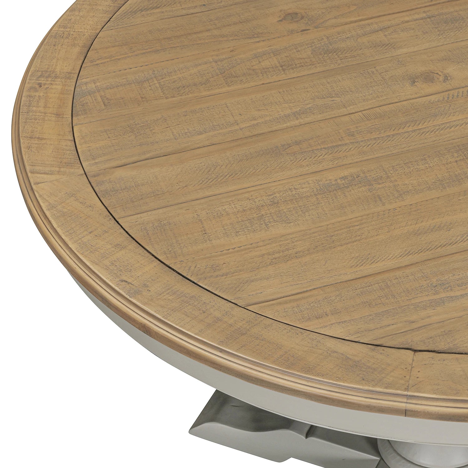 Close-up of a Chateau Grey & Rustic Pine round dining table showing the tabletop with visible wood grain and a light gray pedestal base against a white background.