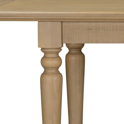 Close up of Chateau Rustic dining table  Solid pine extending dining with timeless farmhouse style.