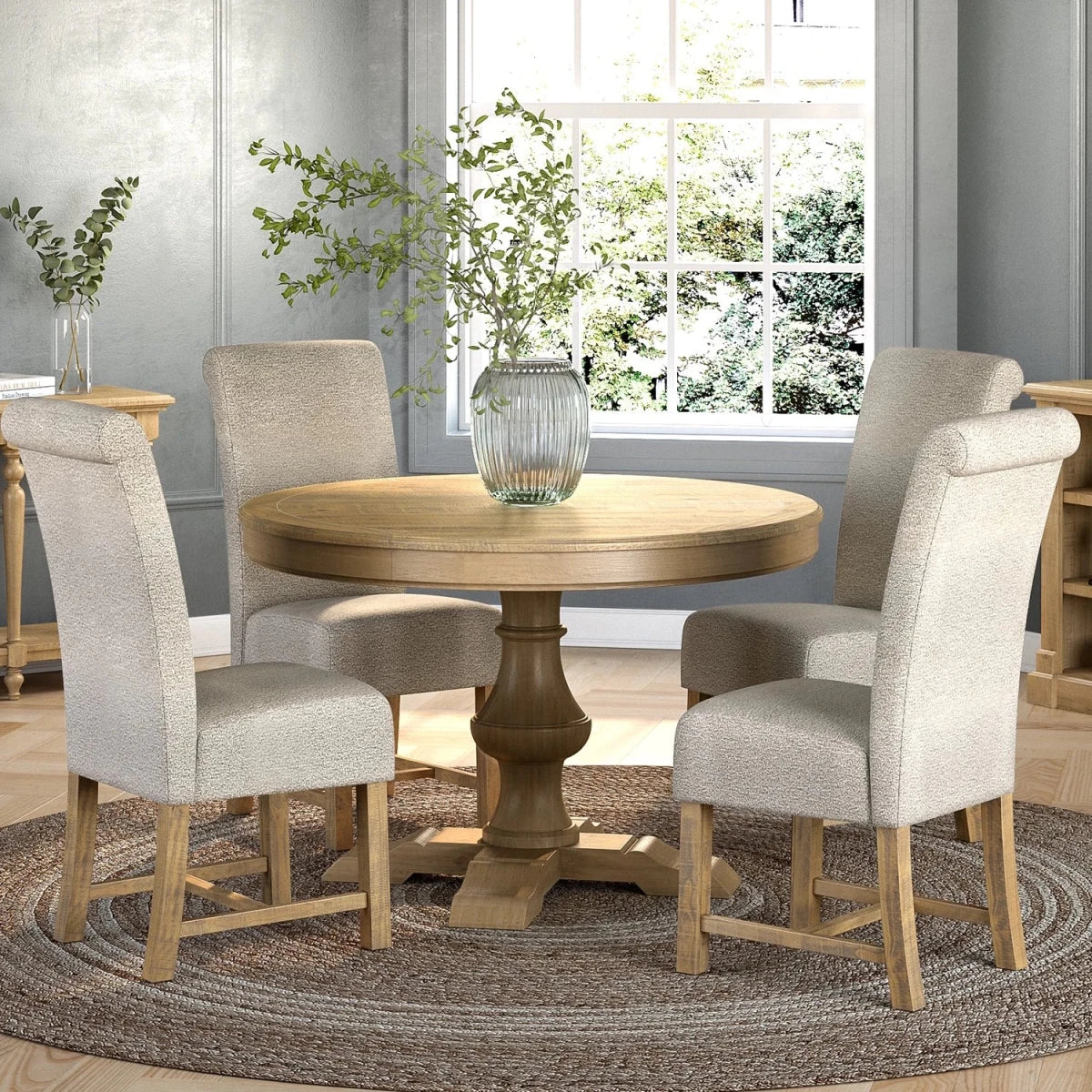 Shop the Chateau Rustic round dining table set with 4 beige upholstered chairs. Solid pine farmhouse dining set with timeless French country styling.