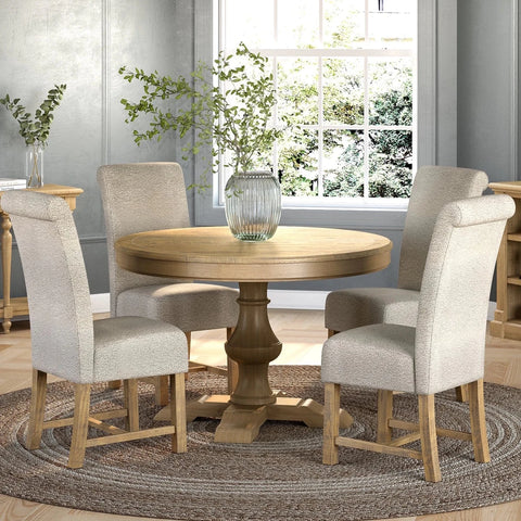 Shop the Chateau Rustic round dining table set with 4 beige upholstered chairs. Solid pine farmhouse dining set with timeless French country styling.