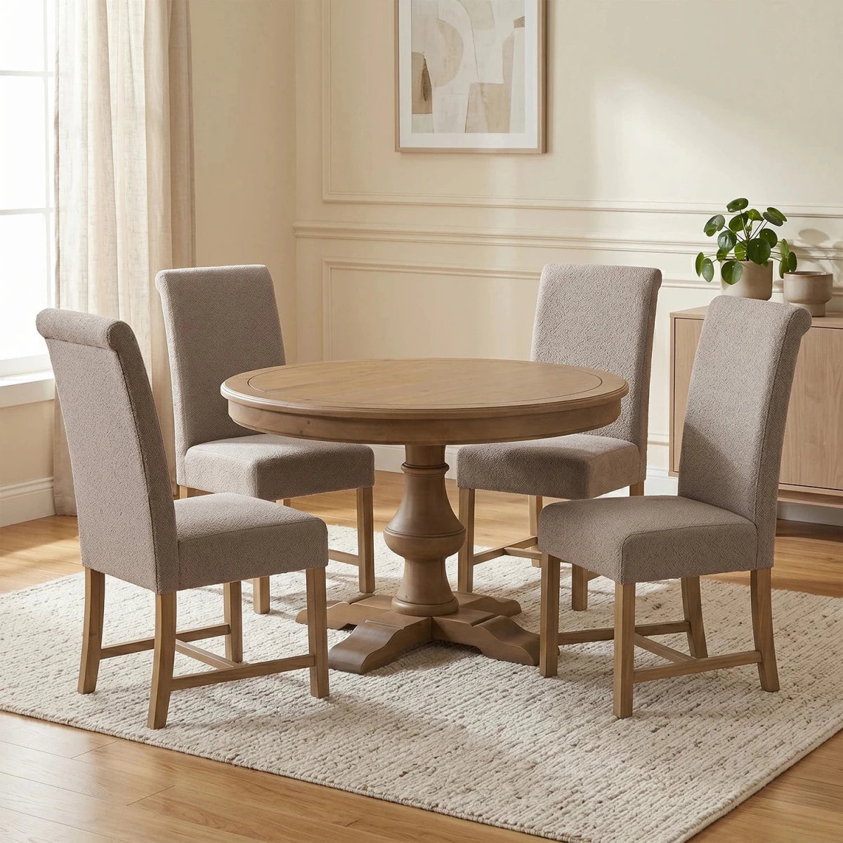 Chateau Rustic round dining table set with 4 beige upholstered chairs. Solid pine farmhouse dining set with timeless French country styling.
