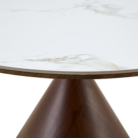 Close up Ciro round dining table with walnut sculptural base