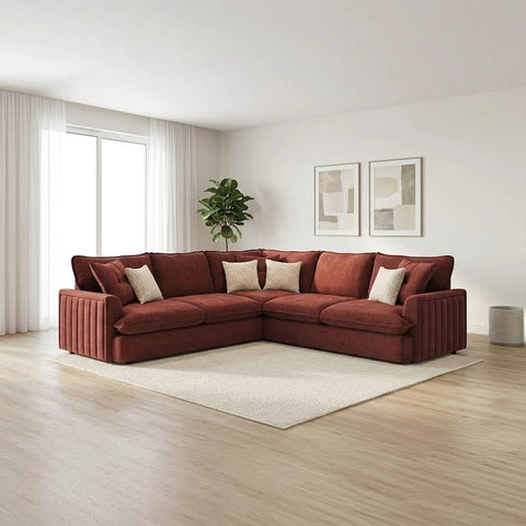 Stylish modern fabric sofa with soft upholstery, deep comfortable seating, plush back cushions, and sleek black feet.