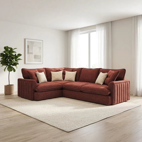 Modern corner fabric sofa with soft upholstery, deep comfortable seating, plush back cushions.