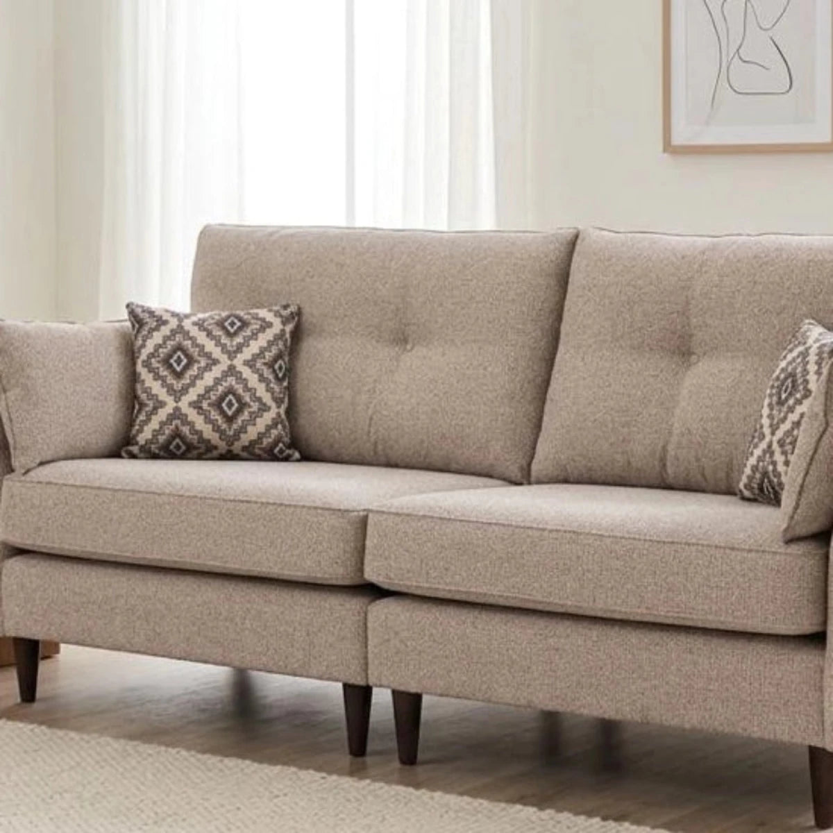 Crawley Alanah 4 seater with geometric cushions and contemporary look.