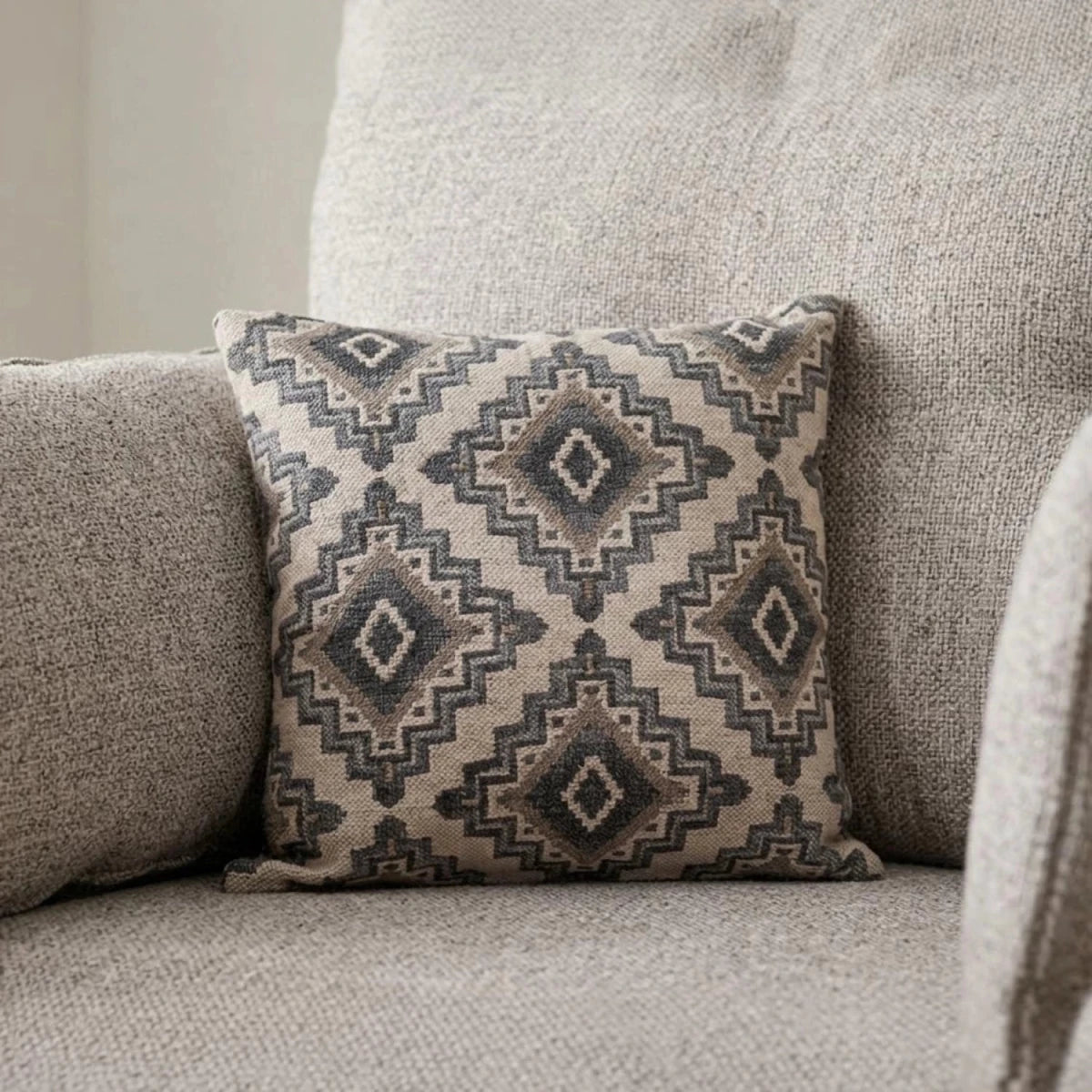 Crawley Alanah cushions with geometric pattern and soft fabric.