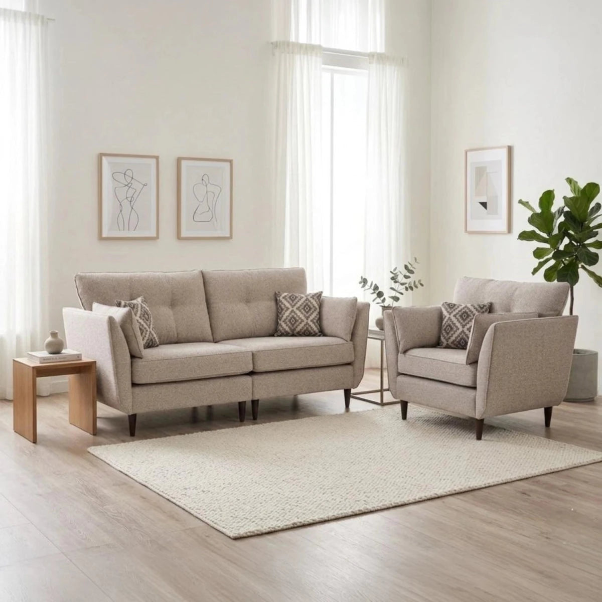 Crawley Alanah 4 seater sofa and chair showing high legs and geometric cushions.