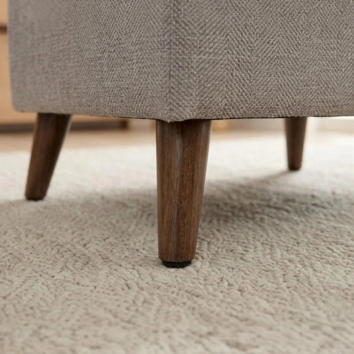 Detail of Crawley Alanah sofa feet with sleek raised design and sturdy build.