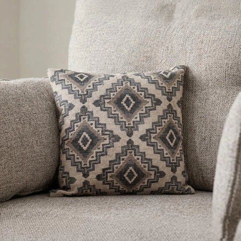 etail of scatter cushions showing textured fabric and modern design.