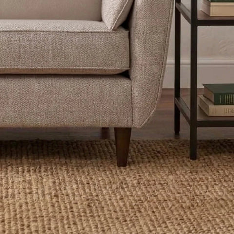 Close-up of sofa legs highlighting elevated structure and contemporary design.