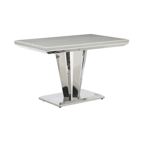 Modern dining table with a white marble-like top and chrome legs on a white background