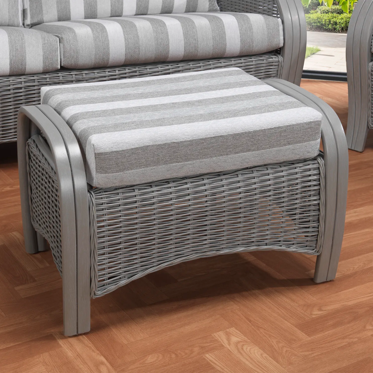 Desser Turin Grey Rattan Striped Footstool in Duke Grey, Pair with the matching 3 Seater, 2 Seater, Swivel Rocker, Swivel Chair and Armchair. Customise your footstool by choosing from various fabrics and Grey or Oak frame - Lifestyle Image 
