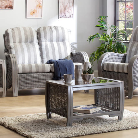 Desser Turin Grey Rattan 2 Seater Sofa in Duke Stripe fabric, also available in a 3 Seater, Swivel Rocker, Swivel Chair, Armchair and Footstool.  Choose from various fabrics and a Grey or Oak frame Lifestyle Image 