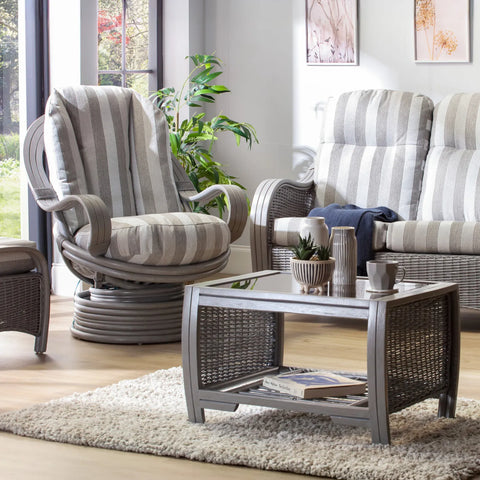 Desser Turin Grey Striped Rattan Swivel Rocker in Duke Grey, also available in a 3 Seater, 2 Seater, Armchair and Footstool.  Choose from various fabrics and customise the frame from a choice of Grey or Light Oak - Lifestyle Image
