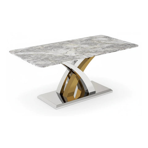 Dining table with marble top and modern metal base on a white background