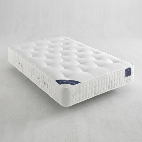 Dorlux Knightsbridge 2000 pocket spring mattress with natural cotton fillings, firm comfort and a fully turnable design. Made in the UK.