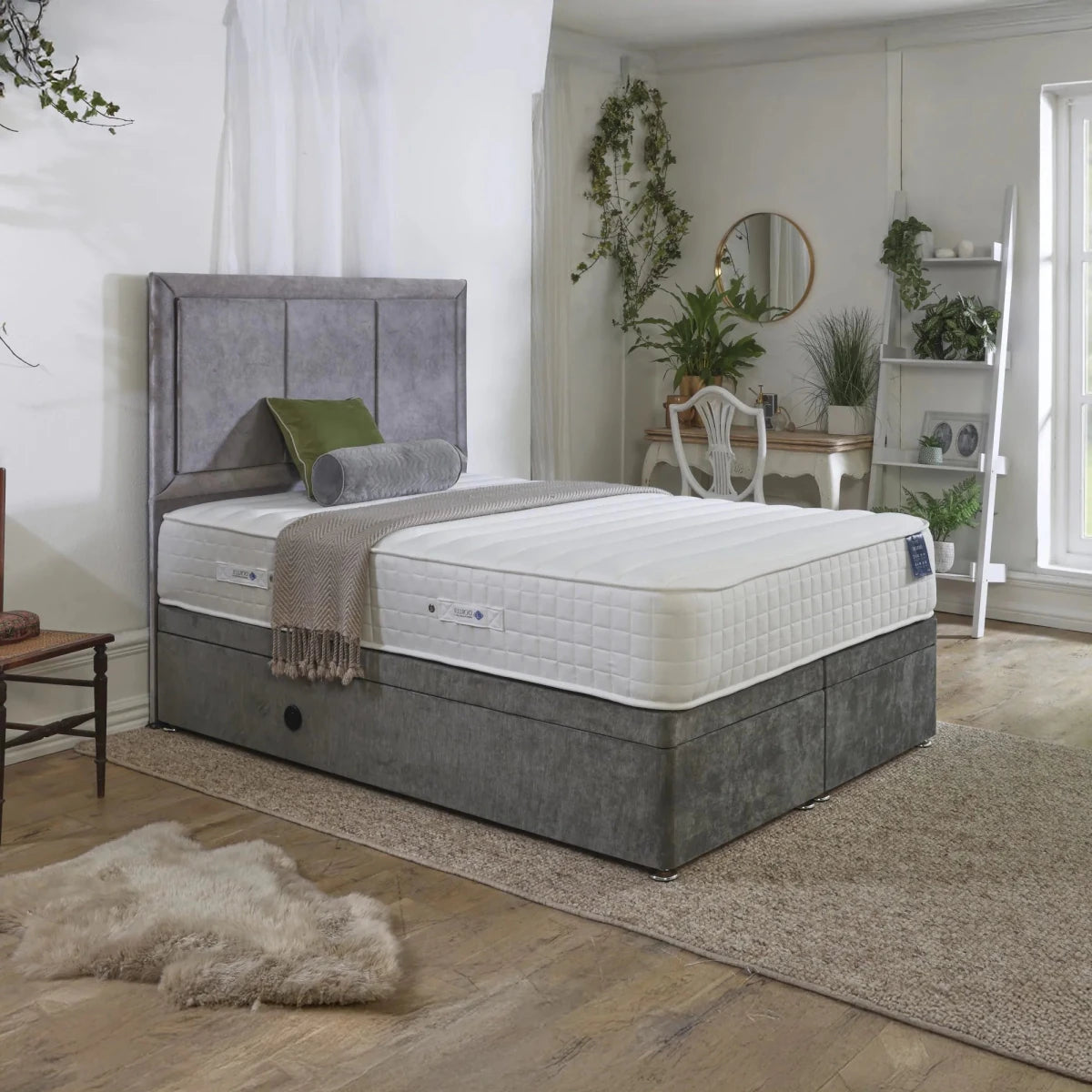 A bed with a gDorlux Oxford 1000 Pocket Spring Firm Edge Mattress