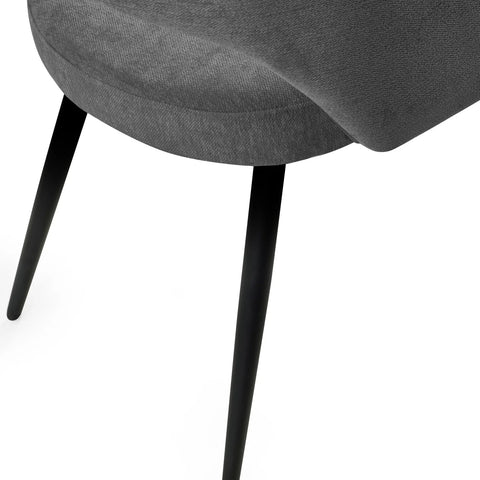 Close up Elara Calico Grey Fabric Half Moon Back Dining Chairs with Black Metal Legs