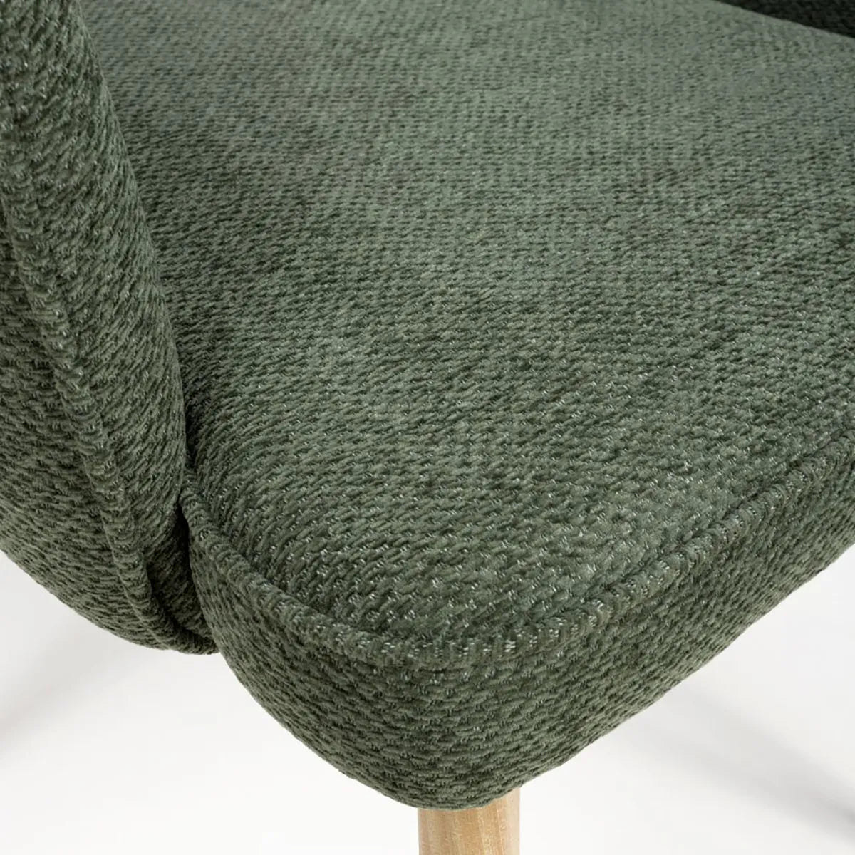 Set of 4 Eaton modern dining armchairs in green fabric. Soft padded seat, light wood legs & ergonomic shape for comfort & style.- Fabric Closeup