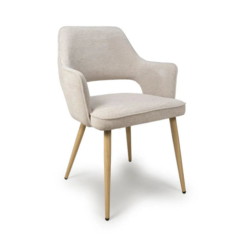 Set of 4 Eaton modern dining armchairs in Natural fabric. Soft padded seat, light wood legs & ergonomic shape for comfort & style.