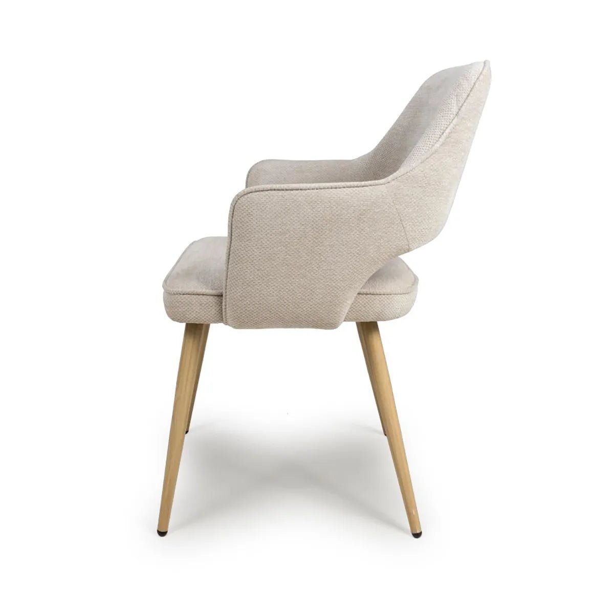 Set of 4 Eaton modern dining armchairs in Cream fabric. Soft padded seat, light wood legs & ergonomic shape for comfort & style.