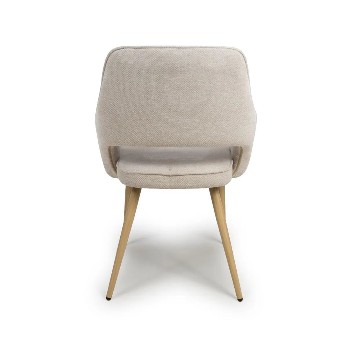 Back View of Eaton modern dining armchairs in Natural fabric. Soft padded seat, light wood legs & ergonomic shape for comfort & style.