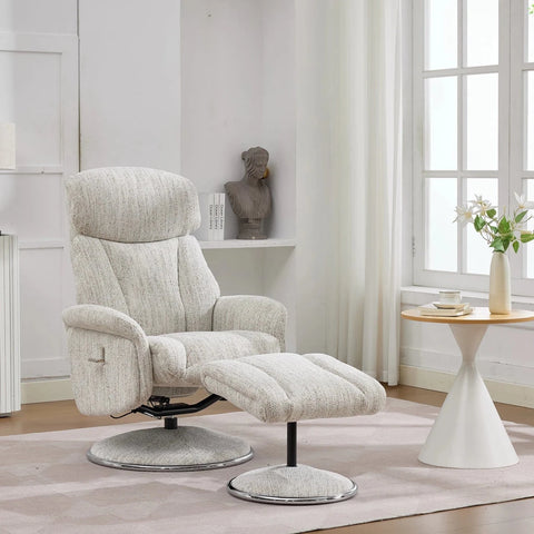 A light beige textured fabric recliner chair with an adjustable footrest, set in a bright, modern living room next to a small side table by a window.