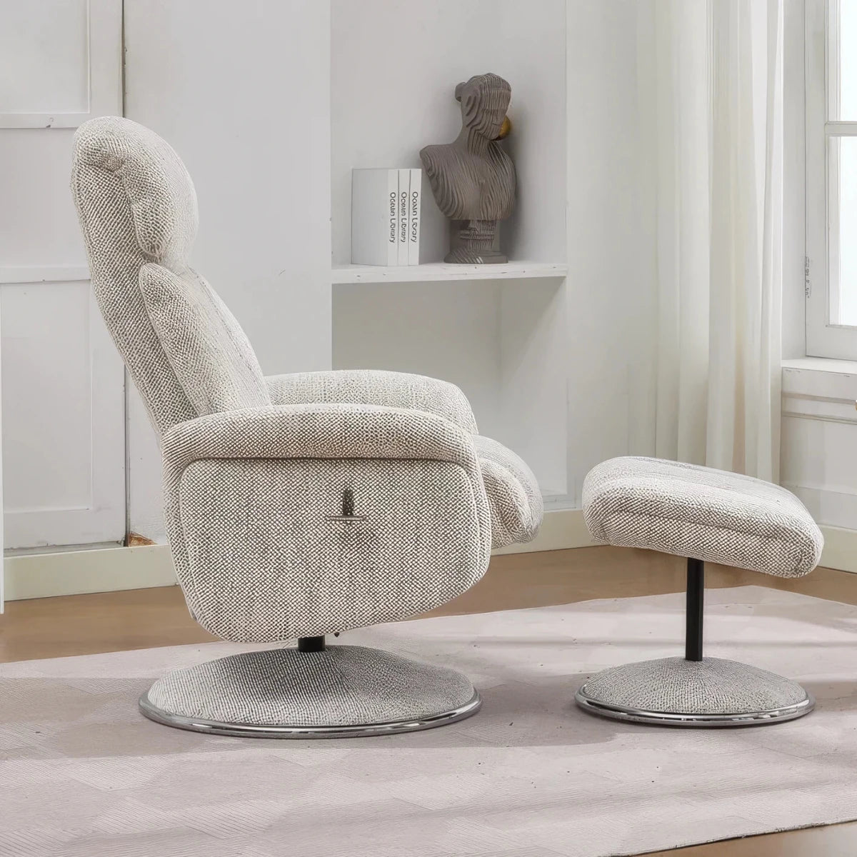 Shop the Elma fabric swivel recliner chair with footstool in Dove, Biscuit or Espresso. High-back comfort, manual recline and 360° swivel action.