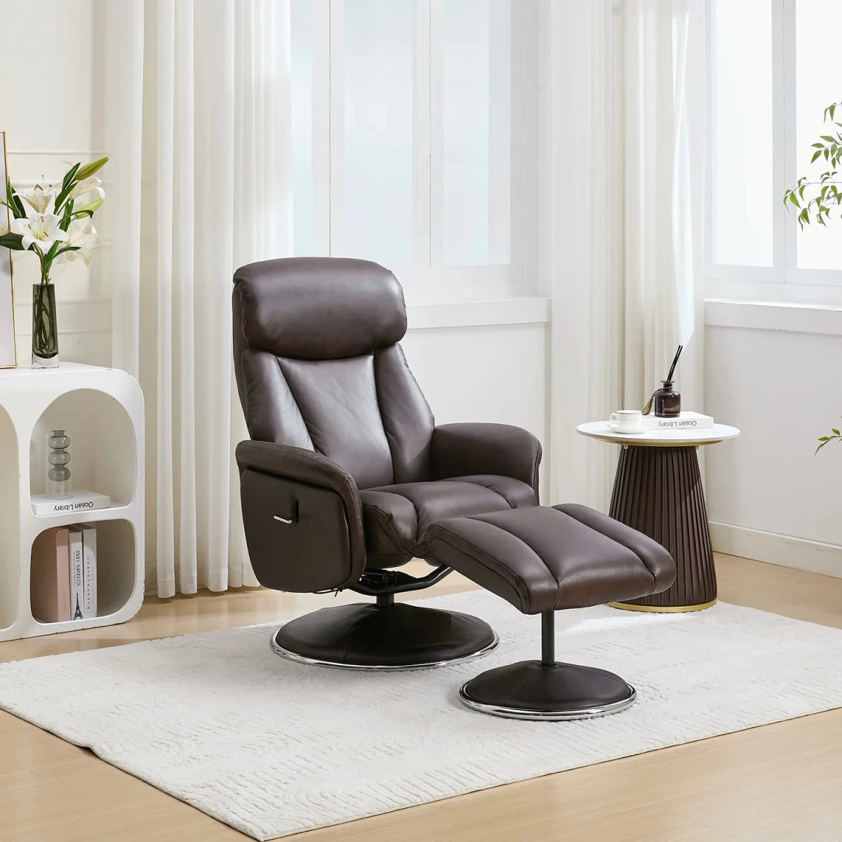 A dark brown Elma Full Leather Swivel Recliner Chair & Footstool
