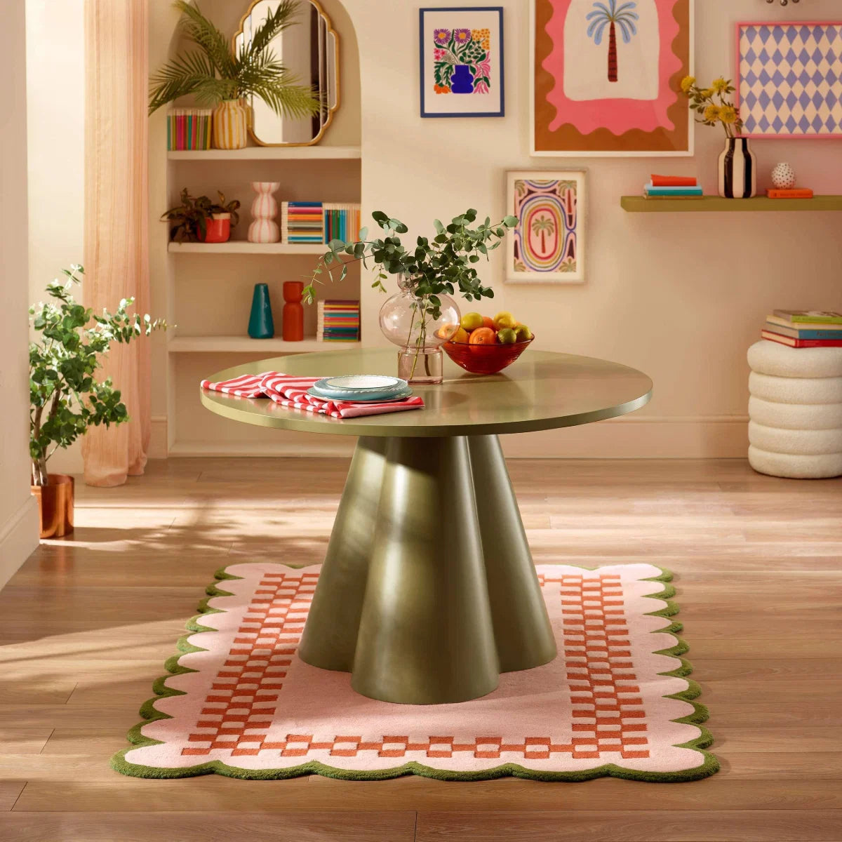 Shop the Felix 120cm Sage Green Round Dining Table. Seats 4 with a sculptural pedestal base, smooth circular top and contemporary statement design.